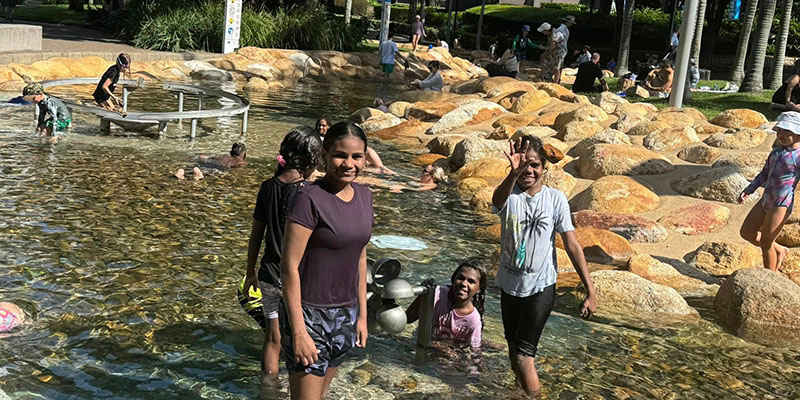 Students playing in water