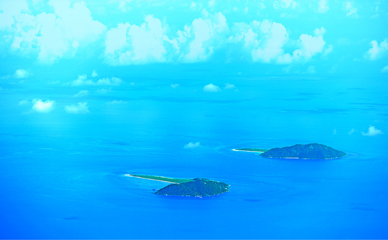Two islands surrounded by ocean